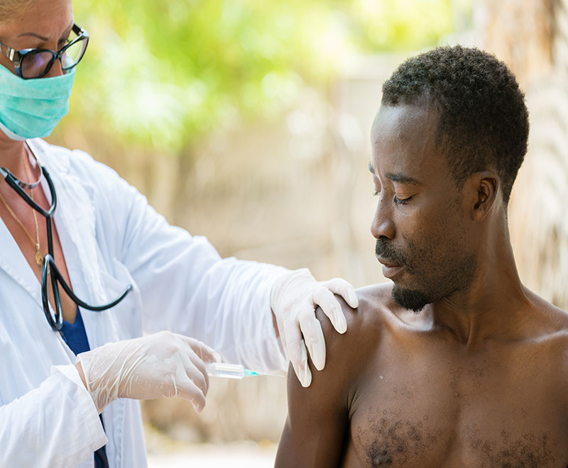 image of man given vaccine for ebola virus