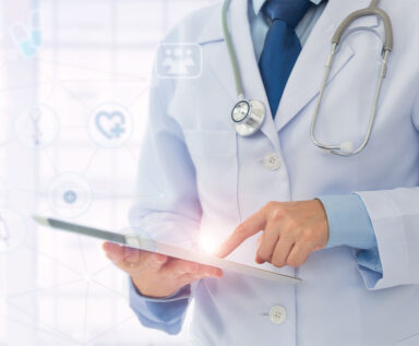 Image of medical provider using tablet