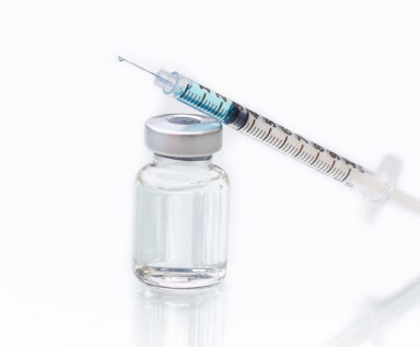 Image of vaccine vial and syringe