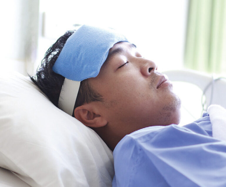 patient resting in hospital bed