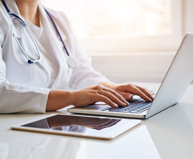 Healthcare worker on computer