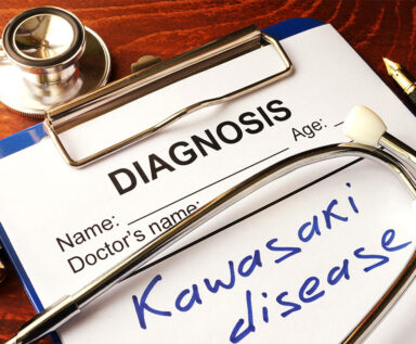 Clipboard and stethoscope with "Kawasaki disease" written on the paper