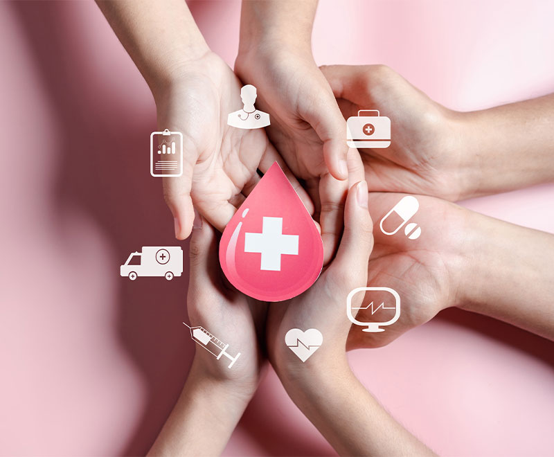 Photo of many hands holding and illustration of a blood drop