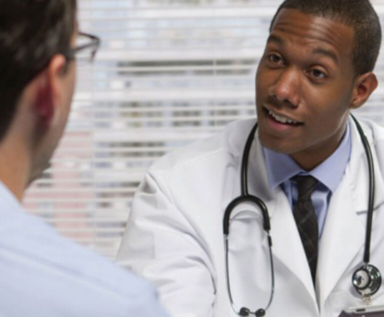 Photo of doctor talking with a patient